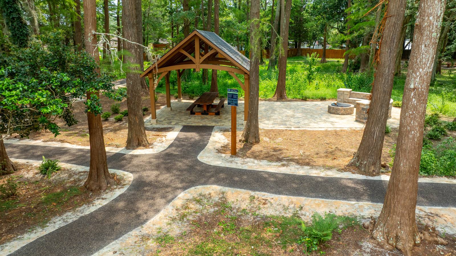 Flexus AP-200 installed — pavilion, picnic area, and Azalea Park signage